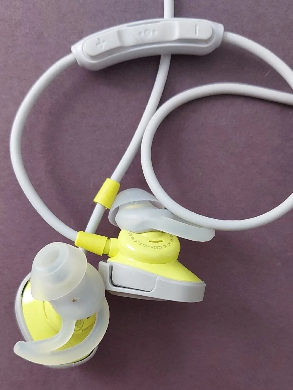 Bose Light Gray Round Earbud Case with Yellow Logo